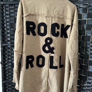 Tan Jacket with Black 'Rock & Roll' Text